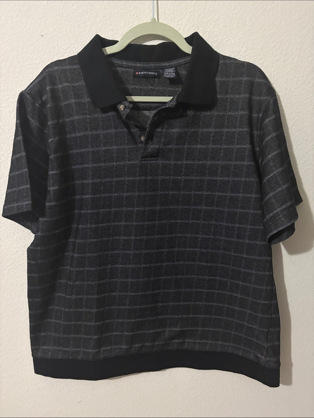 Haggar. Size Medium polo 60% cotton 40% polyester. Made in Tanzania